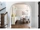 Elegant dining room with hardwood floors, stylish chandelier, and comfortable seating for six at 1486 Brooklyn Nw Ave, Atlanta, GA 30309
