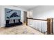 Upstairs hall with seating area and large art piece at 1486 Brooklyn Nw Ave, Atlanta, GA 30309