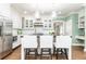 Kitchen includes an island with stools, stainless steel appliances, and ample counter space at 1486 Brooklyn Nw Ave, Atlanta, GA 30309