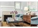 Beautifully decorated living room featuring a fireplace, stylish decor, and comfortable seating at 1486 Brooklyn Nw Ave, Atlanta, GA 30309
