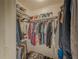 Walk-in closet with shelving and hanging rods filled with shoes, clothing, and accessories at 2610 Cumberland Ct, Smyrna, GA 30080