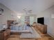 Well-lit main bedroom featuring a ceiling fan, modern furnishings, and decor at 2610 Cumberland Ct, Smyrna, GA 30080