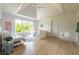 Bright bedroom with hardwood floors, white walls, and modern hanging chair at 5160 Howard Rd, Cumming, GA 30040