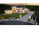 Charming home with a manicured lawn, a spacious driveway, and a welcoming entrance, perfect curb appeal at 5160 Howard Rd, Cumming, GA 30040