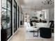 Open-concept living space with hardwood floors and large windows at 5160 Howard Rd, Cumming, GA 30040