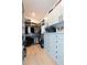 Large walk-in closet featuring custom storage systems, including shelves, drawers, and hanging rods at 5160 Howard Rd, Cumming, GA 30040