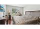 This bedroom features hardwood floors and great natural light at 1045 River Valley Dr, Dacula, GA 30019