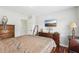 This bedroom has hardwood floors and a great view of the neighborhood at 1045 River Valley Dr, Dacula, GA 30019