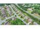 Beautiful two-story home with brick facade, grassy lawn, mature trees, and long driveway in desirable suburban community at 1370 Sunnys Halo Dr, Suwanee, GA 30024