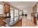 Bright eat-in kitchen featuring stainless steel appliances, granite counters, and an island, plus an eat-in kitchen area at 1370 Sunnys Halo Dr, Suwanee, GA 30024