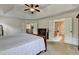 Spacious main bedroom showcasing natural lighting and neutral colors at 1370 Sunnys Halo Dr, Suwanee, GA 30024