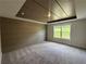 Spacious bedroom with carpet and an accent wall at 257 Depot Landing Rd # 39, Auburn, GA 30011
