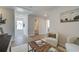 The light-filled upstairs hallway features a reading nook and full bath at 257 Depot Landing Rd # 39, Auburn, GA 30011