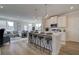 Modern kitchen with island seating, stainless steel appliances, and stylish design at 257 Depot Landing Rd # 39, Auburn, GA 30011