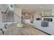 Bright, open-concept living space with hardwood floors, fireplace, and modern decor at 257 Depot Landing Rd # 39, Auburn, GA 30011