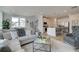 Spacious living area featuring a modern kitchen, dining area, and comfortable seating at 257 Depot Landing Rd # 39, Auburn, GA 30011