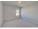 Cozy bedroom with carpeted floors and natural light at 266 Tulip Dr, Covington, GA 30016