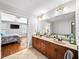 Bathroom featuring double sinks, a soaking tub, and a walk-in shower at 3857 Felton Hill Sw Rd # 9, Smyrna, GA 30082