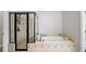 Bathroom featuring a walk-in shower and separate soaking tub at 3857 Felton Hill Sw Rd # 9, Smyrna, GA 30082