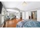 Bedroom features hardwood floors, a comfortable seating area, and ample closet space at 3857 Felton Hill Sw Rd # 9, Smyrna, GA 30082