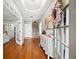 Inviting foyer with hardwood floors, a decorative table, beautiful art, and a staircase leading to the upper level at 3857 Felton Hill Sw Rd # 9, Smyrna, GA 30082