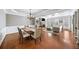 Open concept living and dining room with hardwood floors and fireplace at 3857 Felton Hill Sw Rd # 9, Smyrna, GA 30082