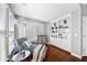 Sitting area features hardwood floors, a comfortable chair, and a built-in bookcase at 3857 Felton Hill Sw Rd # 9, Smyrna, GA 30082