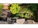 Top-down shot of deck featuring an outdoor dining set, seating area, grill, and lush garden at 4566 Fountain Ne Dr, Marietta, GA 30067