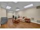 Finished basement living area with hardwood floors, and comfortable seating at 4566 Fountain Ne Dr, Marietta, GA 30067