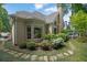 Exterior view of a home with landscaped garden and stone walkway at 4566 Fountain Ne Dr, Marietta, GA 30067