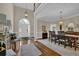 Elegant foyer featuring hardwood floors, a grand staircase, and a dining area at 4566 Fountain Ne Dr, Marietta, GA 30067