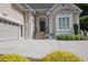 Charming home featuring a stone staircase leading to the front door and attached garage at 4566 Fountain Ne Dr, Marietta, GA 30067