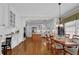 Spacious kitchen and dining area featuring wood floors and granite countertops at 4566 Fountain Ne Dr, Marietta, GA 30067