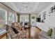 Bright and airy living room with a tray ceiling and built-in shelving at 4566 Fountain Ne Dr, Marietta, GA 30067