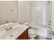 Clean bathroom with a shower-tub combination, modern fixtures, and vanity with sink at 7630 Volion Pkwy, Fairburn, GA 30213