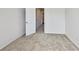 Carpeted bedroom showcasing neutral tones, a modern design, and well-lit ambiance at 7630 Volion Pkwy, Fairburn, GA 30213