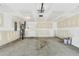 Unfinished garage with water heater and garage door opener visible at 7630 Volion Pkwy, Fairburn, GA 30213