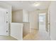 Upstairs hallway with carpet floor at 7630 Volion Pkwy, Fairburn, GA 30213