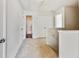 Hallway with carpet floor, with a view of the bathroom at 7630 Volion Pkwy, Fairburn, GA 30213