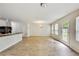 Bright and airy living area with lots of natural light coming in and a hardwood floor at 7630 Volion Pkwy, Fairburn, GA 30213