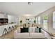 Inviting living room with comfortable seating, a neutral palette, and a stylish open floor plan at 7630 Volion Pkwy, Fairburn, GA 30213