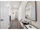 Inviting hallway leads to other areas of the home, featuring hardwood floors and stylish decor at 853 Bentley Drive Dr, Fairburn, GA 30213