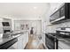 Modern kitchen featuring stainless steel appliances, granite countertops, and a functional layout at 853 Bentley Drive Dr, Fairburn, GA 30213