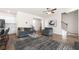 Cozy living room features hardwood floors, neutral paint, and comfortable seating at 853 Bentley Drive Dr, Fairburn, GA 30213