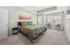 Spacious main bedroom featuring a tray ceiling, carpet floors and bright, sunny windows at 853 Bentley Drive Dr, Fairburn, GA 30213
