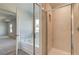 Bathroom featuring walk-in shower and soaking tub at 107 St Annes Pl, Covington, GA 30016