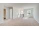 The upstairs loft is carpeted and offers access to upstairs bedrooms and bathrooms at 107 St Annes Pl, Covington, GA 30016
