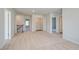 Second floor loft area offering an open space with natural light and hallway access to bedrooms and closets at 107 St Annes Pl, Covington, GA 30016