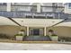 Elegant building entrance at 2499 Peachtree Road with manicured landscaping and inviting access at 2499 Peachtree Ne Rd # 108, Atlanta, GA 30305