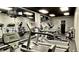 A well-equipped gym featuring treadmills, stationary bikes, weights, and mirrored walls for a complete workout experience at 2499 Peachtree Ne Rd # 108, Atlanta, GA 30305